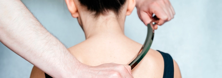 Chiropractic Lancaster PA Hero SASTM Woman receiving treatment from sound assisted soft tissue.