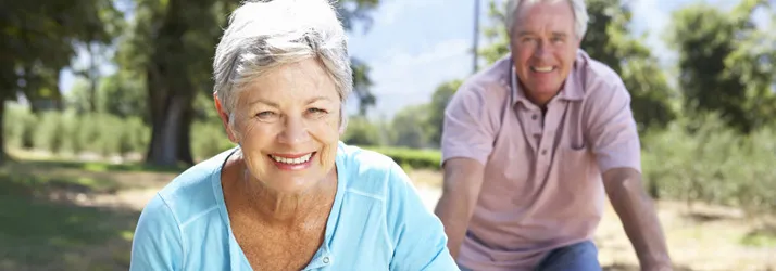 Chiropractic Lancaster PA Wellness Hero Elderly couple riding bicycles, very happy time.
