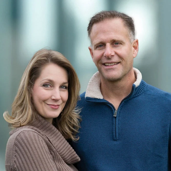 Chiropractor Lancaster PA Keith Krueger HP Dr. Keith Krueger and Sally Krueger posing together, both smiling.
